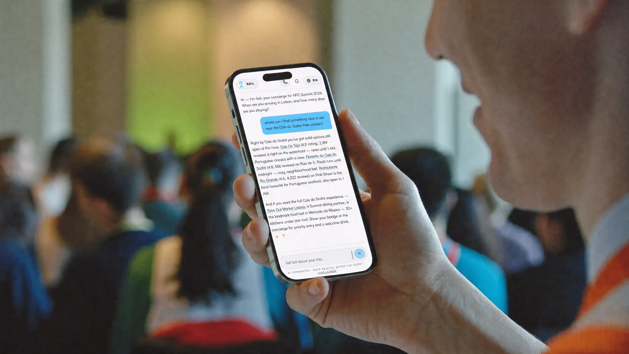 An attendee checking the concierge on their phone at a conference